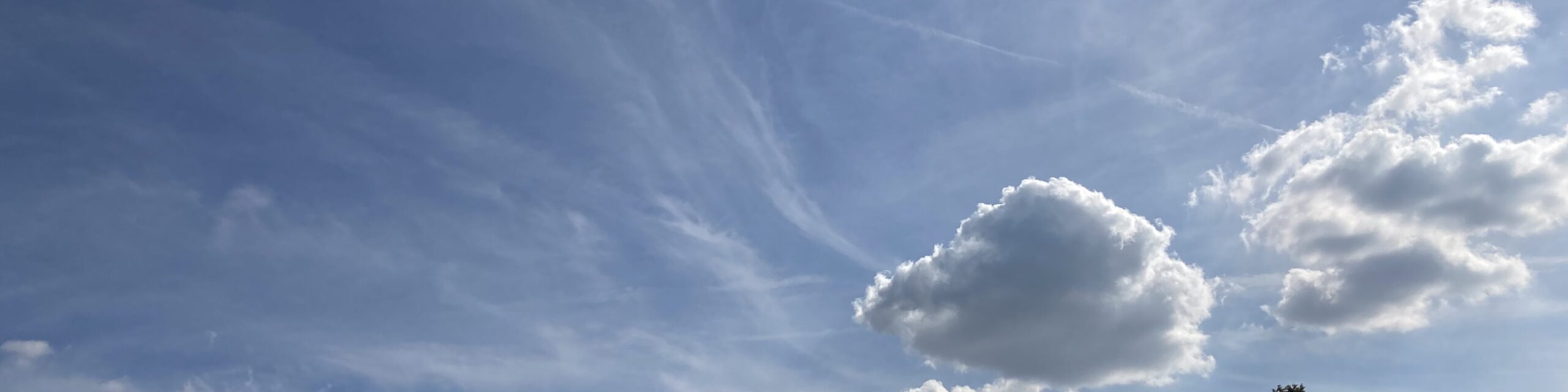 Wolkenspiel und Sonne